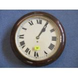 A late Victorian school clock having a painted dial in a mahogany case