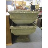 A pair of large reconstituted stone square planters