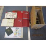 Eleven stamp albums together with a box of loose worldwide stamps