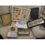 A mixed lot of ephemera to include stamps, matchbox cards in albums and other items