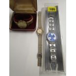A boxed The Angus 25 Jewel automatic gents wrist watch, a boxed Swatch watch with a blue dial and