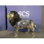 A boxed Swarovski Crystal Society model entitled Lion Akill