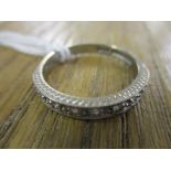 An 18ct white gold half eternity ring, 3g