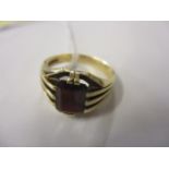 A 9ct gold garnet set ring