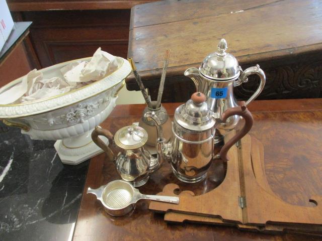 A mixed lot to include a silver plated tea strainer, a coffee pot, a silver ashtray and other items