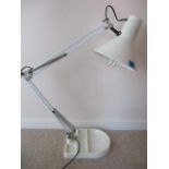 A Flemish enamelled anglepoise desk lamp with an enamelled base