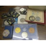 Mixed coins and medallions to include a limited edition silver Churchill medal, Crowns, some