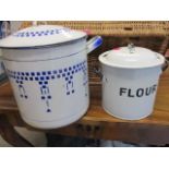 Two mid 20th century enamelled kitchen canisters to include one with the inscription 'Flour'