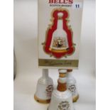 Four Bells Wade Whisky decanters to include one commemorating the birth of Prince William of Wales