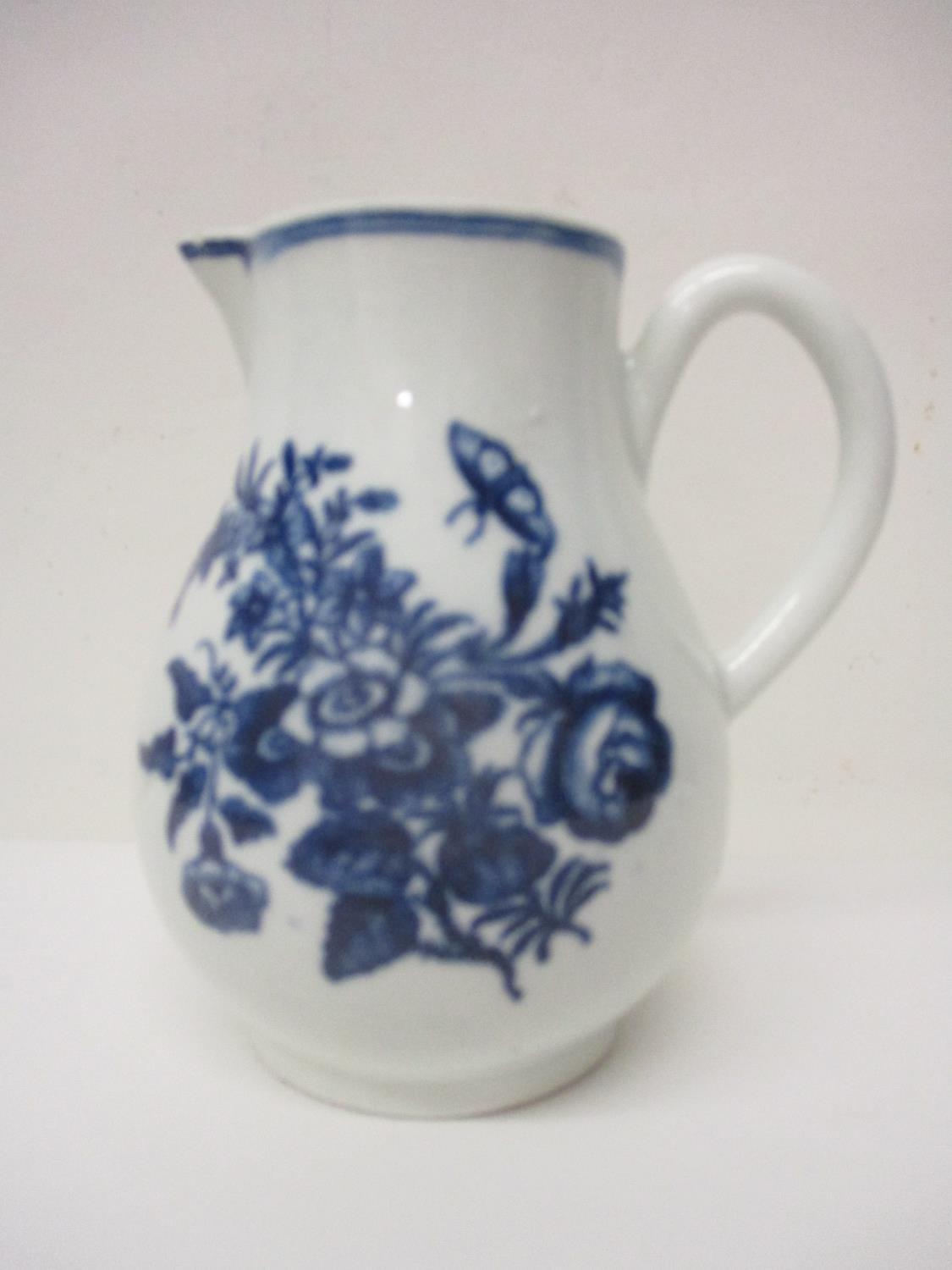 A late 18th century Worcester sparrow beak jug decorated with flowers and butterflies in blue and - Image 3 of 5