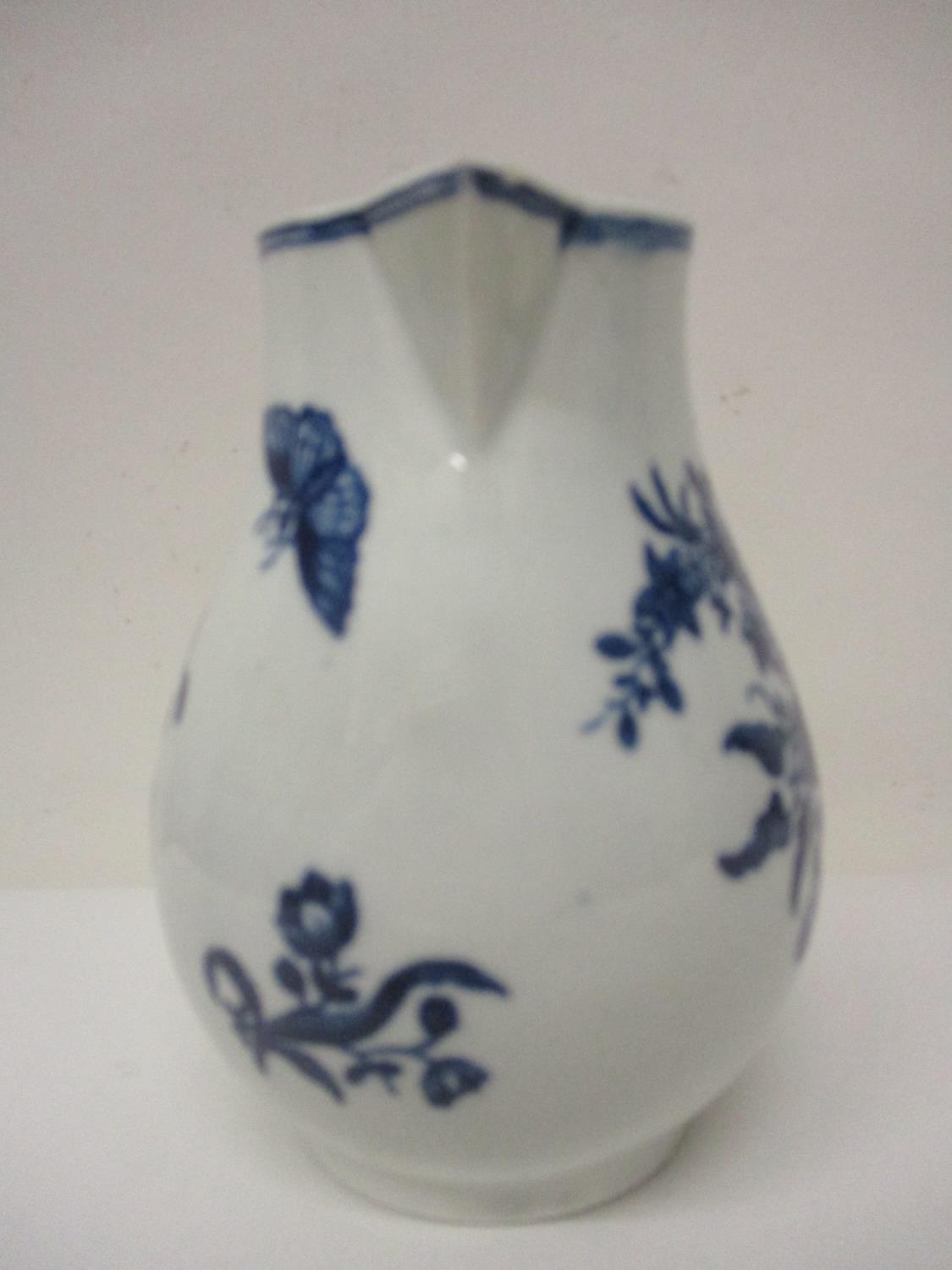 A late 18th century Worcester sparrow beak jug decorated with flowers and butterflies in blue and - Image 4 of 5