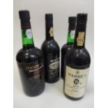 Four bottles of Port to include Warres 1974 Dow 1979, a 75cl bottle of Cockburn's and a 1 litre