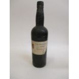 A bottle of AA Ferreira 1945 vintage Port, label damaged