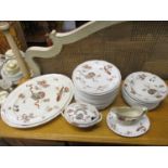A Victorian Staffordshire part dinner service decorated with Oriental-inspired objects