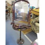 A Victorian mahogany dressing table mirror with barley twist supports, together with a mahogany