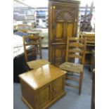 Modern oak furniture to include a corner cabinet, two chairs and a television cabinet