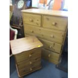 A modern pine chest of two short and three long drawers, 38 1/2" h, 34"w and a pine bedside chest