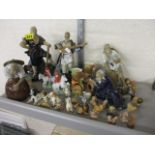 A mixed lot to include, twenty four mini wade figures, alongside some Japanese figurines and other