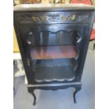 A Victorian ebonized display cabinet with single drawer above a single glass door, 41" x 22" x 13"