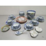 A group of Chinese and Japanese ceramics, early 20th century and later, to include six blue and