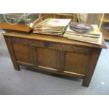 An 18th century and later oak panelled coffer, 24 1/2" H X 45 1/2"w