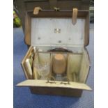 An early 20th century leather cased picnic set by W Thornhill & Co