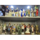 A selection of porcelain military figures to include Staffordshire style figures