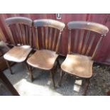 Three 20th century oak farmhouse chairs with bobbin turned legs