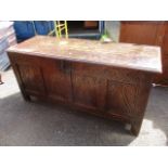 A 17th century oak carved panelled coffer, 26 1/2"h x 56" w, circa 1680