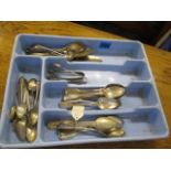 A selection of silver to include teaspoons, salt spoons, sugar nips and others