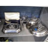 A mixed lot of silver plate to include entree dishes, cased salad serves and other items