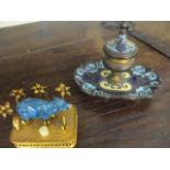 A cloisonne ink well on stand together with an ornate bell in the form of an elephant ( some