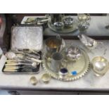 Silver and silver plate to include two silver napkin rings, two silver plated sauce jugs, a tray,