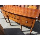 An early 19th century mahogany sideboard on turned legs, 36 1/2" h, 63" w