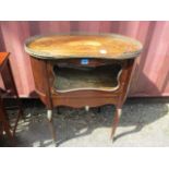 A late 19th century French mahogany, kidney shaped display table