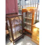 Two early 20th century display cabinets, one mahogany, the other oak, the largest being 60" h x