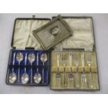 Two boxed sets of silver cutlery and a silver photo frame