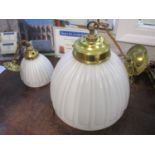 A brass centre light fittings with opaque glass shades, 12" dia and another matching, 6" dia