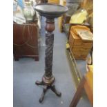 A Victorian mahogany carved torchere stand, 47 3/4"h