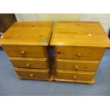 Two modern pine bedside chests with three drawers