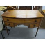 A 19th century mahogany desk having one long and two short drawers, standing on legs, 32 1/2" x 42"w