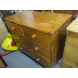 A Victorian pine chest of two short and two long drawers, on bracket feet