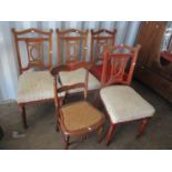 A set of four early 20th century mahogany dining chairs, together with an early 19th century