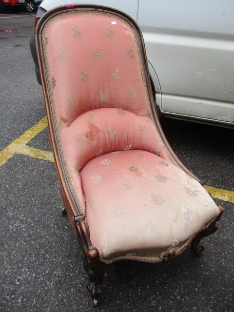 A Victorian mahogany nursing chair