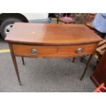 A Victorian mahogany bow fronted side table with single drawer, standing on square, tapering legs