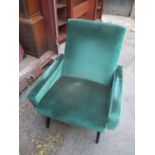 A mid 20th century Parker Knoll armchair