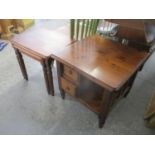 A Ducal coffee table with two drawers and a shelf, 21" h, 22" w and a matching nest of two tables