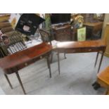 Two similar modern mahogany finished, two drawer hall tables, raised on turned legs