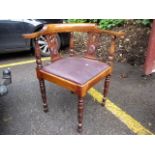 A Victorian walnut framed corner armchair, pierced splats, inset seat, turned legs