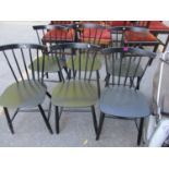 A set of six mid 20th century Danish ebonized stick back chairs